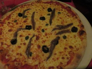The cheese was a sham, the anchovies salty although Ric got past the non-traditional addition of olives and capers on his Pizza Napoli.