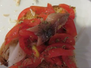 Today with the antipasto, a bruschetta taking advantage of abundant summer tomatoes and a bit of fresh anchovy.