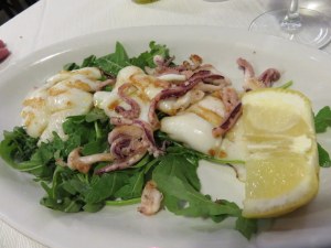 Calamari alla piastra, or grilled calamari, our other favorite. 